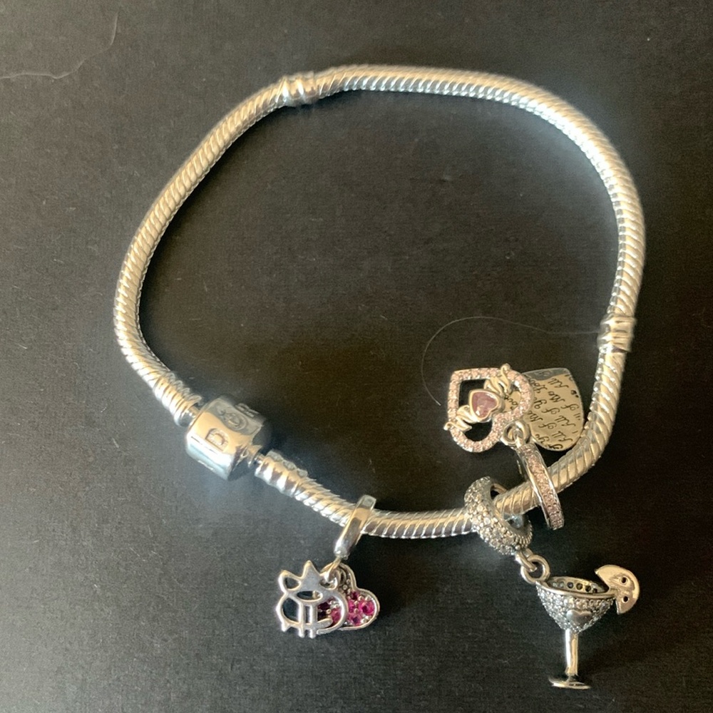 Pandora silver bracelet with 3 charms